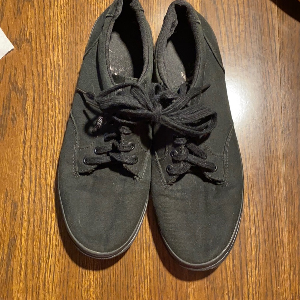 “Off the Wall” black canvas Vans
